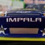 Yes, the splitter (yellow bit) is higher on the car's right, and it's because the g-force in the left turns pushes down harder on that side. Little details.